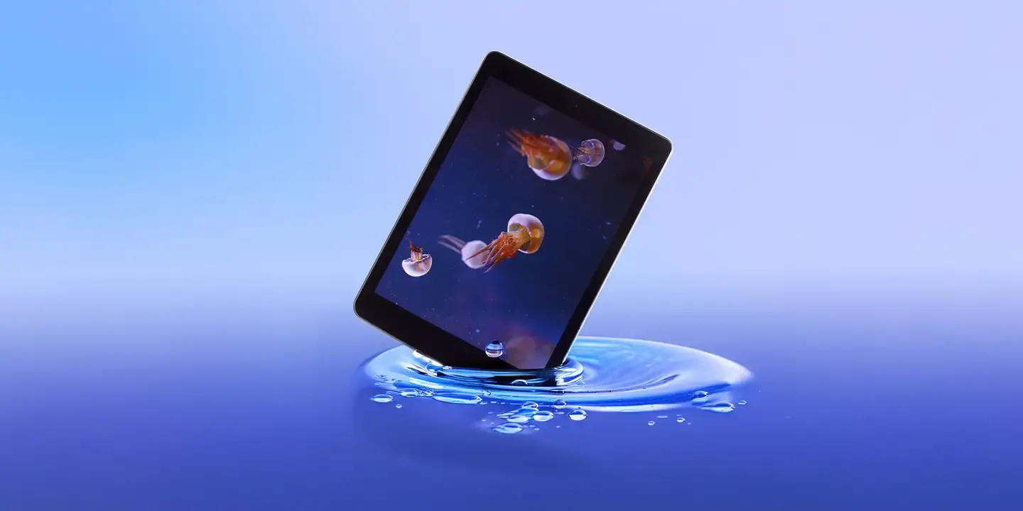 Tablet displaying jellyfish underwater